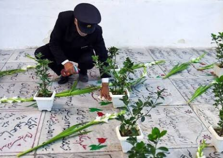 غبارروبی مزار شهدای بهشت ثامن الائمه(ع) توسط خادمان رضوی